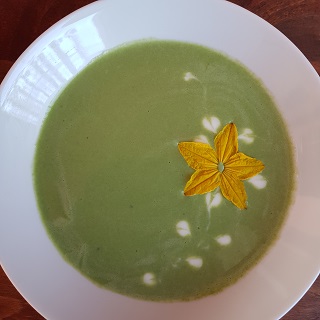 Spinach soup granished with cucumber flower